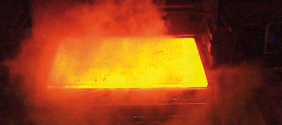 Frequent extreme measuring conditions in a rolling mill caused by water vapour and scales.